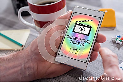 Online movie tickets buying concept on a smartphone Stock Photo