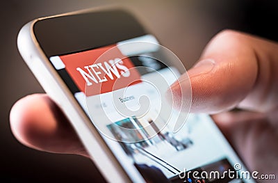 Online news in mobile phone. Close up of smartphone screen. Stock Photo