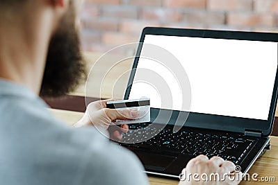 Online payment money transaction man card laptop Stock Photo