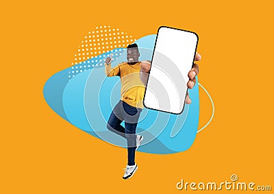 Online Promo. Joyful Black Man Jumping With Big Blank Smartphone In Hand Stock Photo