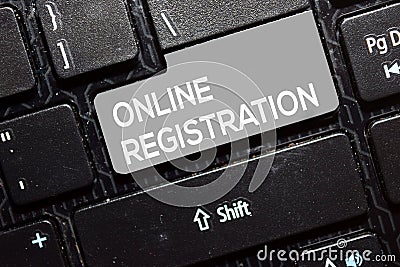 Online Registration write on keyboard isolated on laptop background Stock Photo