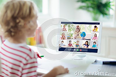 Online remote learning. School kids with computer Stock Photo