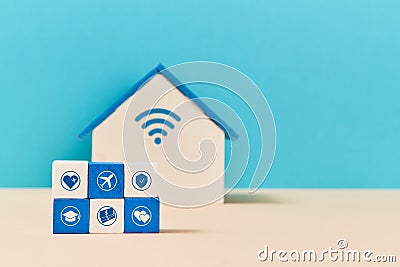 Online services. Smart home. Protection booking distance education healthcare. Miniature house with sign. Copy space Stock Photo