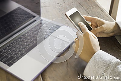 Online shopping with laptop and smart phone Stock Photo