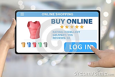 Hand with tablet computer tapping the button log in on bokeh business background - online shopping technology concept Stock Photo