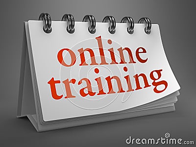 Online Training -Red Word on Desktop Calendar. Stock Photo