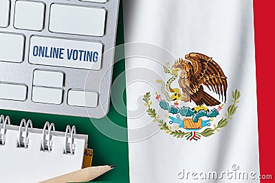 Online voting concept in United Mexican States. Keyboard near country Mexico flag Stock Photo