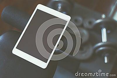 Online weight training coach by tablet Stock Photo