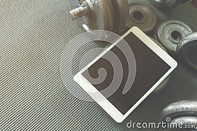 Online weight training coach by tablet Stock Photo