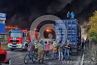 Onlookers gathered to watch a huge fire Editorial Stock Photo