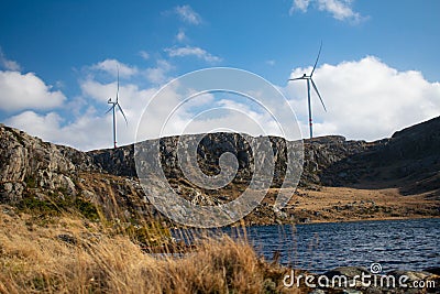 Onshore Windmill in the hills of Norway- a global leader in clean energy adoption Stock Photo