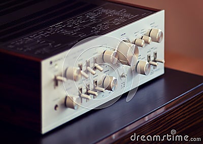 Ontario, Canada - December 26 2017: Vintage Audio Stereo Amplifier Shiny Metal Front Panel Editorial Stock Photo