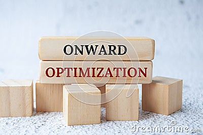 Onward optimization text on wooden blocks. Operational excellence concept Stock Photo