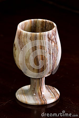 Onyx chalice on a table Stock Photo