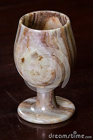 Onyx chalice on a table Stock Photo