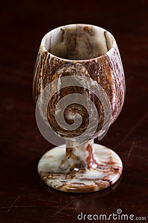 Onyx chalice on a table Stock Photo