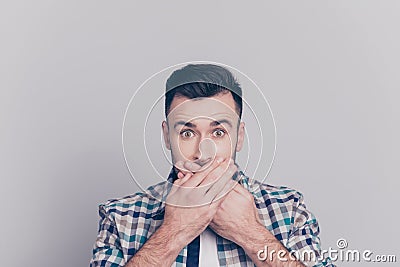 Oops! Close up portrait of attractive man closed his mouth with Stock Photo