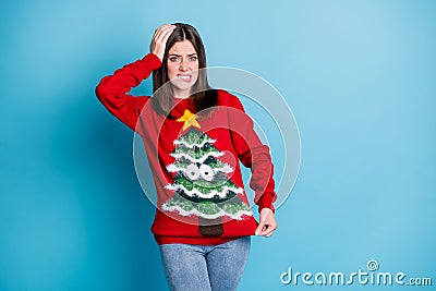 Oops I put a stain on my ugly sweater. Photo portrait of girl pulling jumper in distress holding head with hand isolated Stock Photo