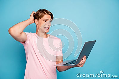 Oops. Profile photo of funny attractive guy holding notebook read error report scratching head have problems wear casual Stock Photo