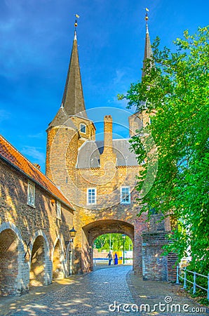 Oostpoort gate leading to the Dutch city Delft, Netherlands Editorial Stock Photo