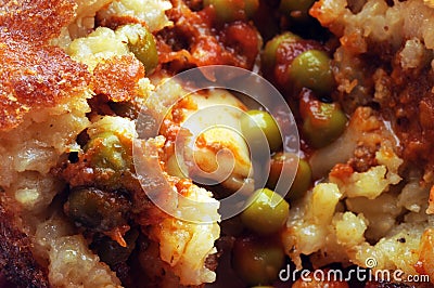 An open arancino showing the rice and ragÃ¹ stuffing. Stock Photo