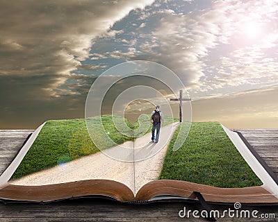 Open bible with man and cross Stock Photo