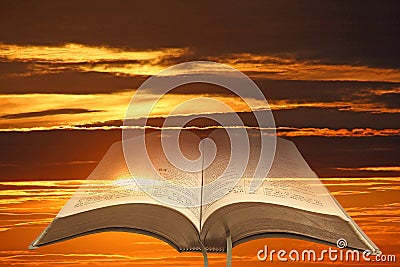 Open bible sky background Stock Photo