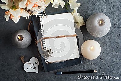 Open blank journal with blossom Stock Photo