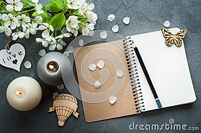 Open blank journal with blossom Stock Photo