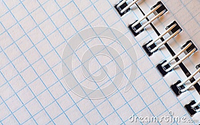 Open blank Notepad in a cage with a spiral binding. Stock Photo
