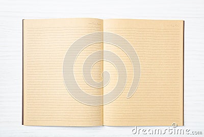 Open blank school notebook or diary, old fashioned, on wooden desk, space for text, top view Stock Photo