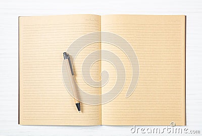 Open blank school notebook or diary, old fashioned, on wooden desk, space for text, top view Stock Photo