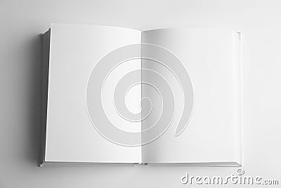 Open book with blank pages on white background. Mock up for design Stock Photo