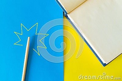 Open book and magical stick Stock Photo