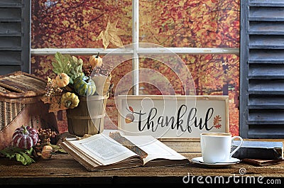 Thankful Sign, Book and Coffee Old Wood Tabletop Stock Photo