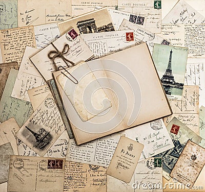 Open book, old letters and postcards. Travel scrapbook France Pa Stock Photo