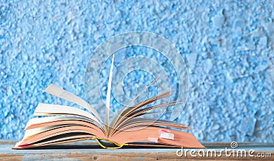 Open book, reading, learning, education, literature concept, close up w. narrow focus Stock Photo