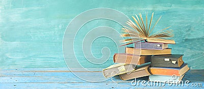 Open book on an stack of books. Stock Photo