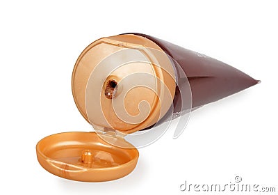 Open brown cream tube Stock Photo