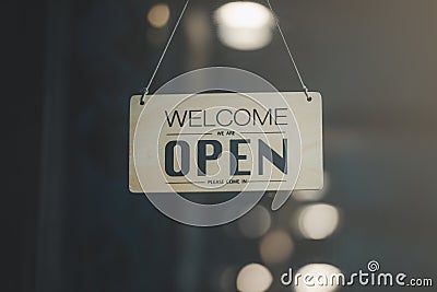 `Open` on cafe or restaurant hang on door at entrance Stock Photo