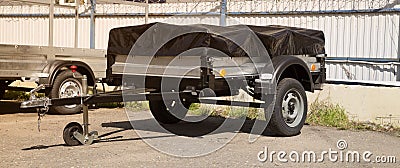 Open car trailer. Trailer for passenger cars.Sale, rental and maintenance of trailers Editorial Stock Photo