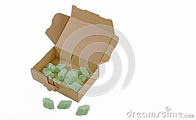 Open cardboard box with green packaging chips Stock Photo