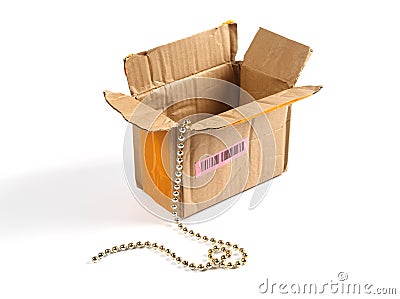 Open cardboard box and precious chain inside. Stock Photo