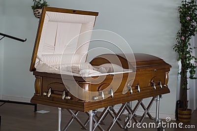 Open Casket in Abandoned Funeral Home Stock Photo