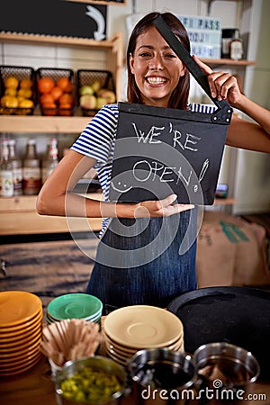 Open coffee shop.woman opening her store Stock Photo