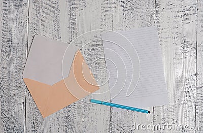 Front view open colored rectangular envelope blank sheet paper ballpoint lying retro vintage rustic old lumber timber Stock Photo