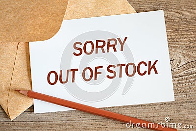 Open craft envelope and card with the words Sorry Out Of Stock Stock Photo