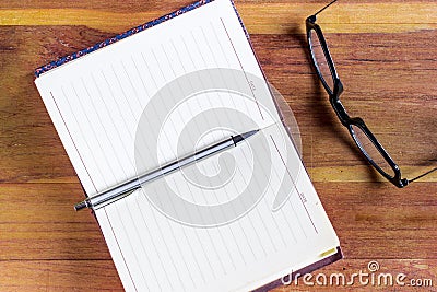 Open diary or office journal with a double page lined blank spread Stock Photo