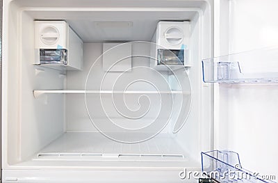 Open empty new white refrigerator inside fridge with shelves Stock Photo