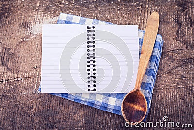 Open empty notebook on wooden background Stock Photo